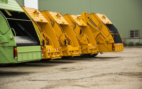 Workers managing demolition waste at a Parsons Green site
